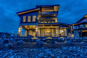 A large house sitting on top of a hill.