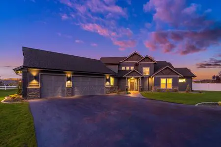 A large house with a lot of windows and doors