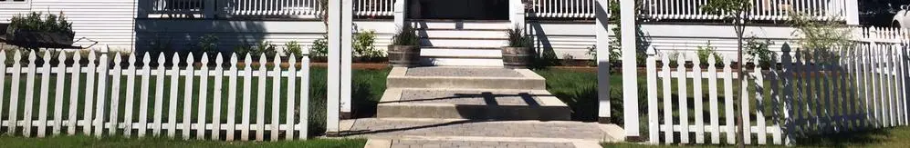 A picture of some steps leading to the front door.